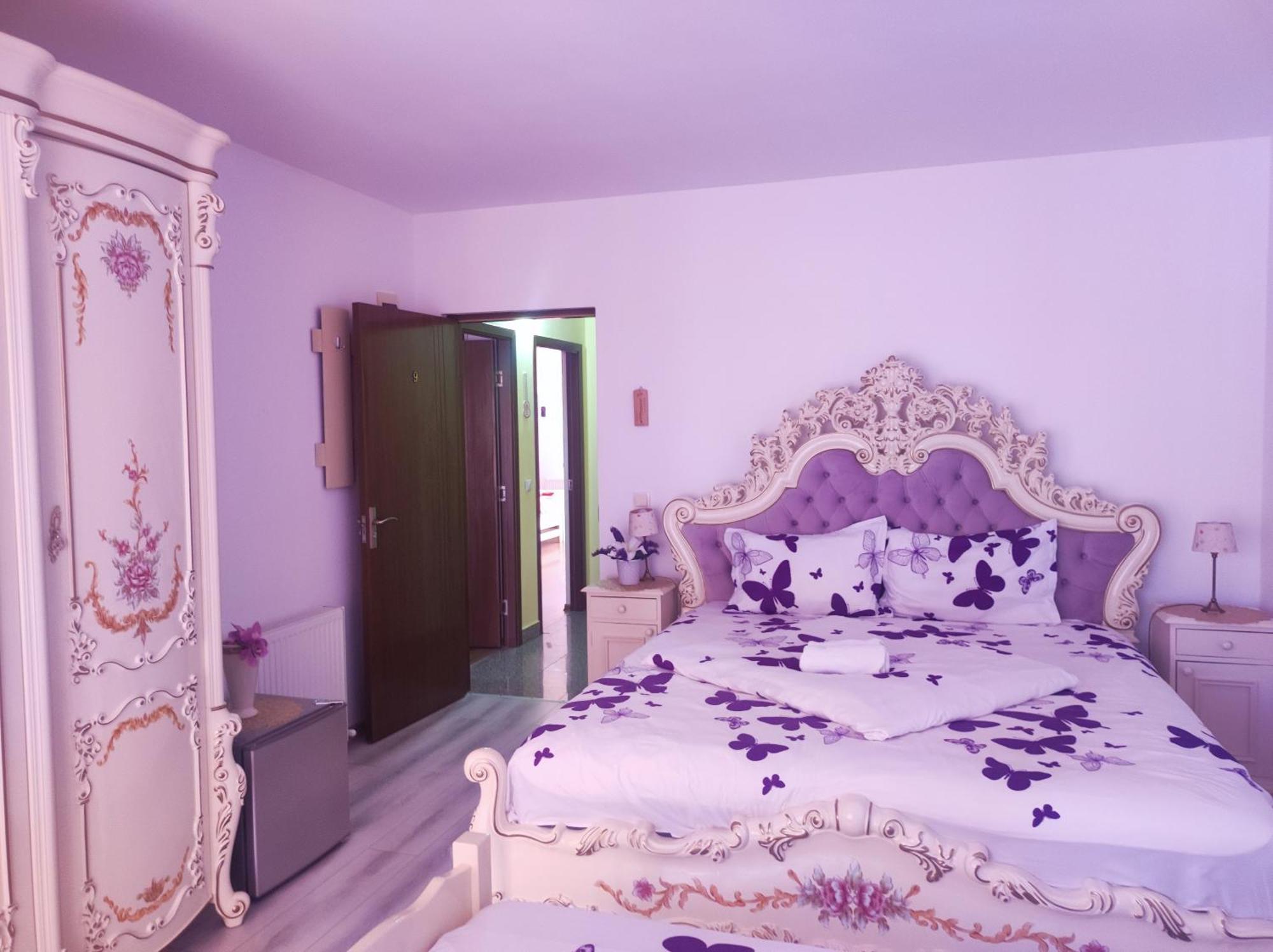 Cameră triplă Deluxe