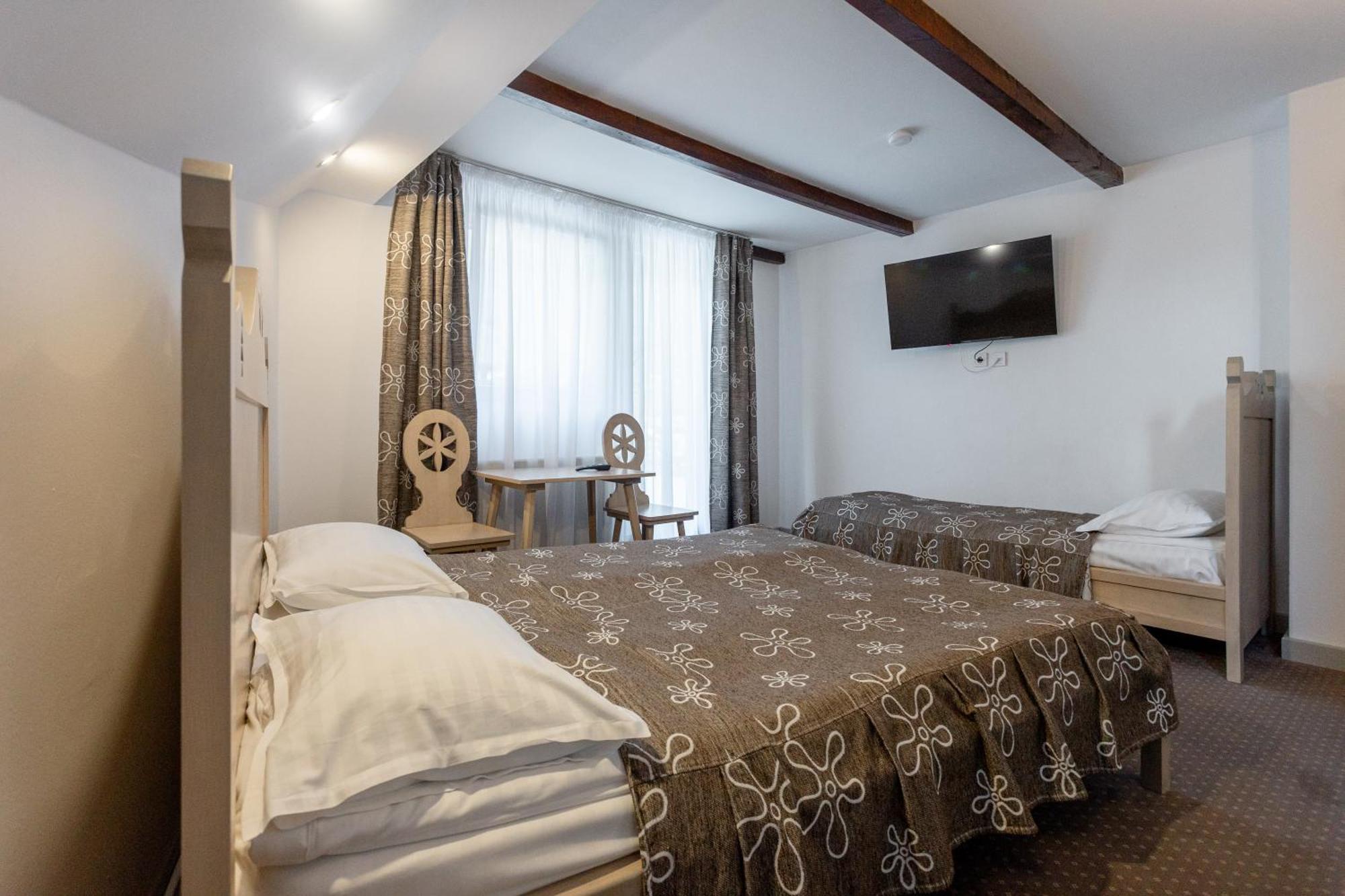 Cameră triplă cu terasă