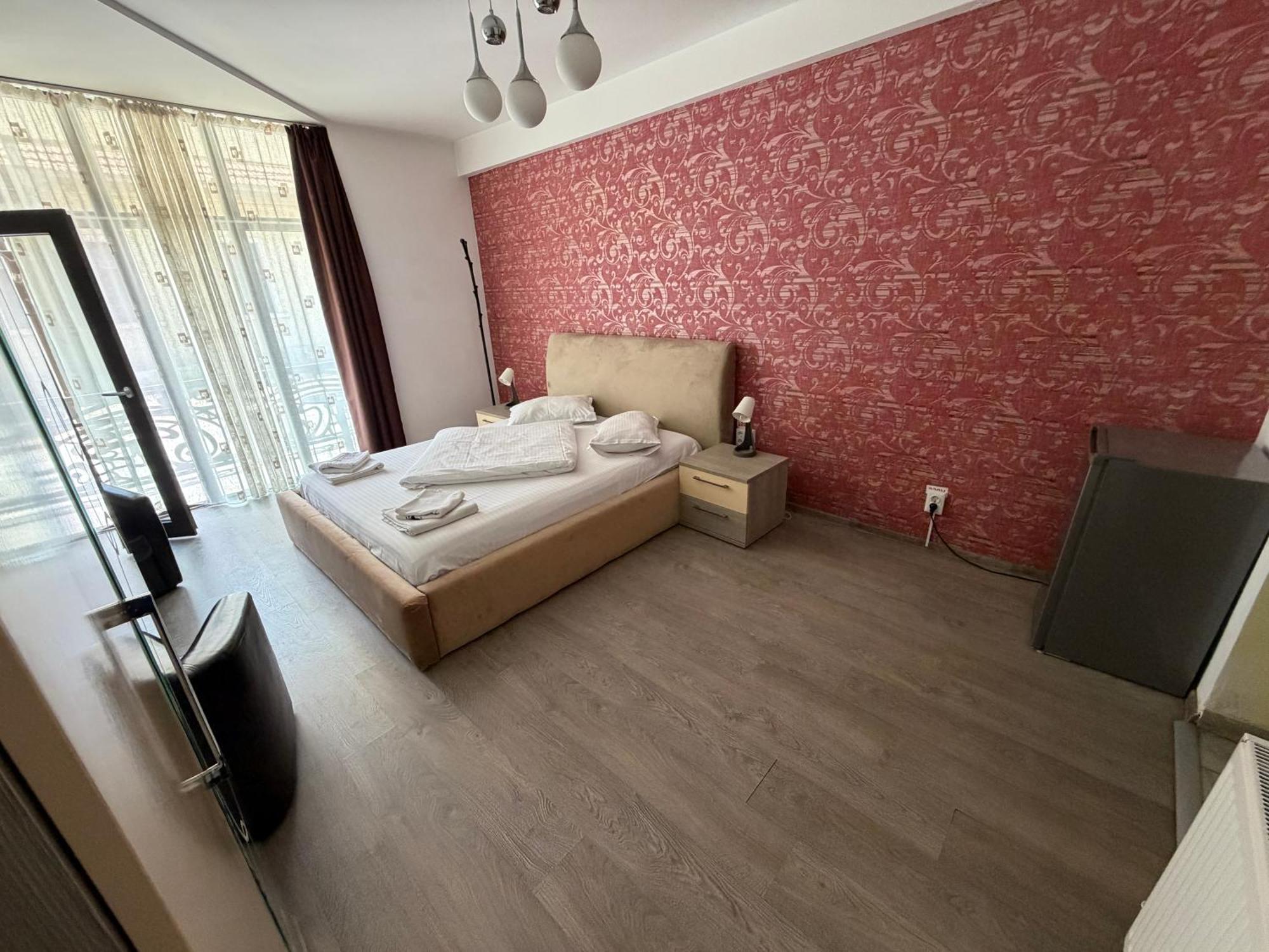 Cameră King cu balcon